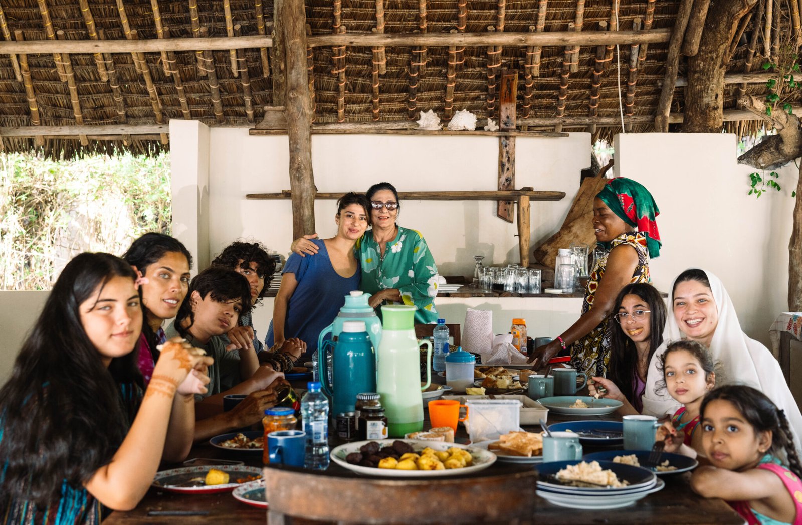Family breakfast gathering during a two-day Zanzibar beach house wedding celebration, bringing together relatives and friends from around the world in an intimate tropical setting.